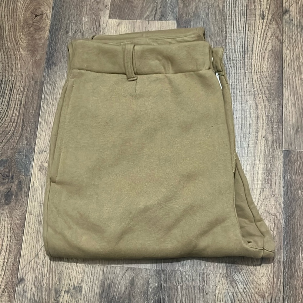 Never worn sweat pants. They are thicker, have a zipper, snap, and belt loops.